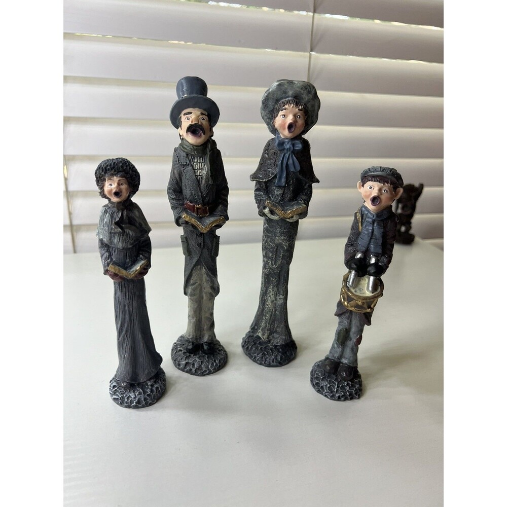 Christmas Decor Carolling Family Set of 4 Pencil Figurines Tall Skinny 97042